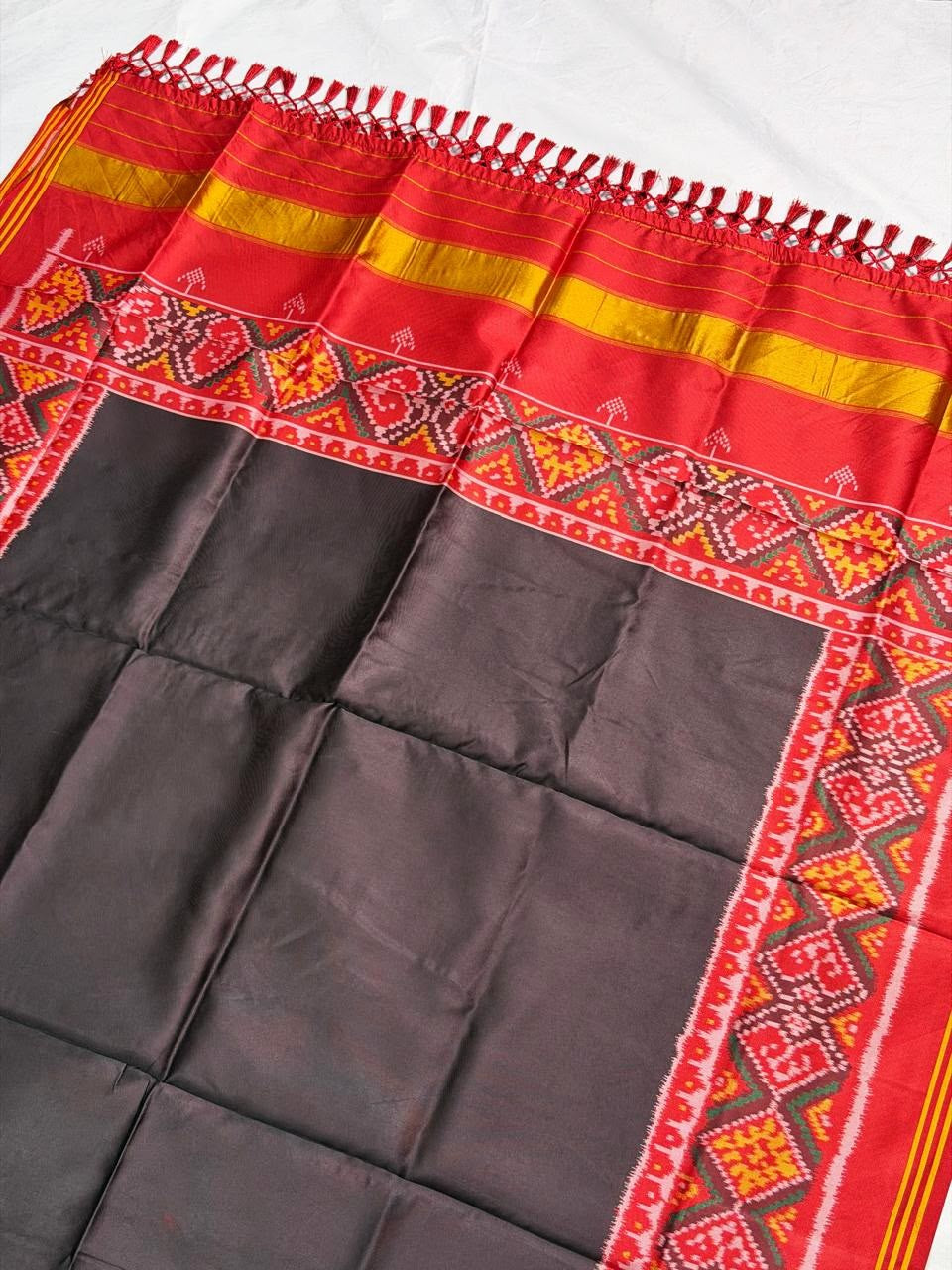 MCD 029: Beautiful Black Patola Silk Dupatta With Tassels And Standard Length