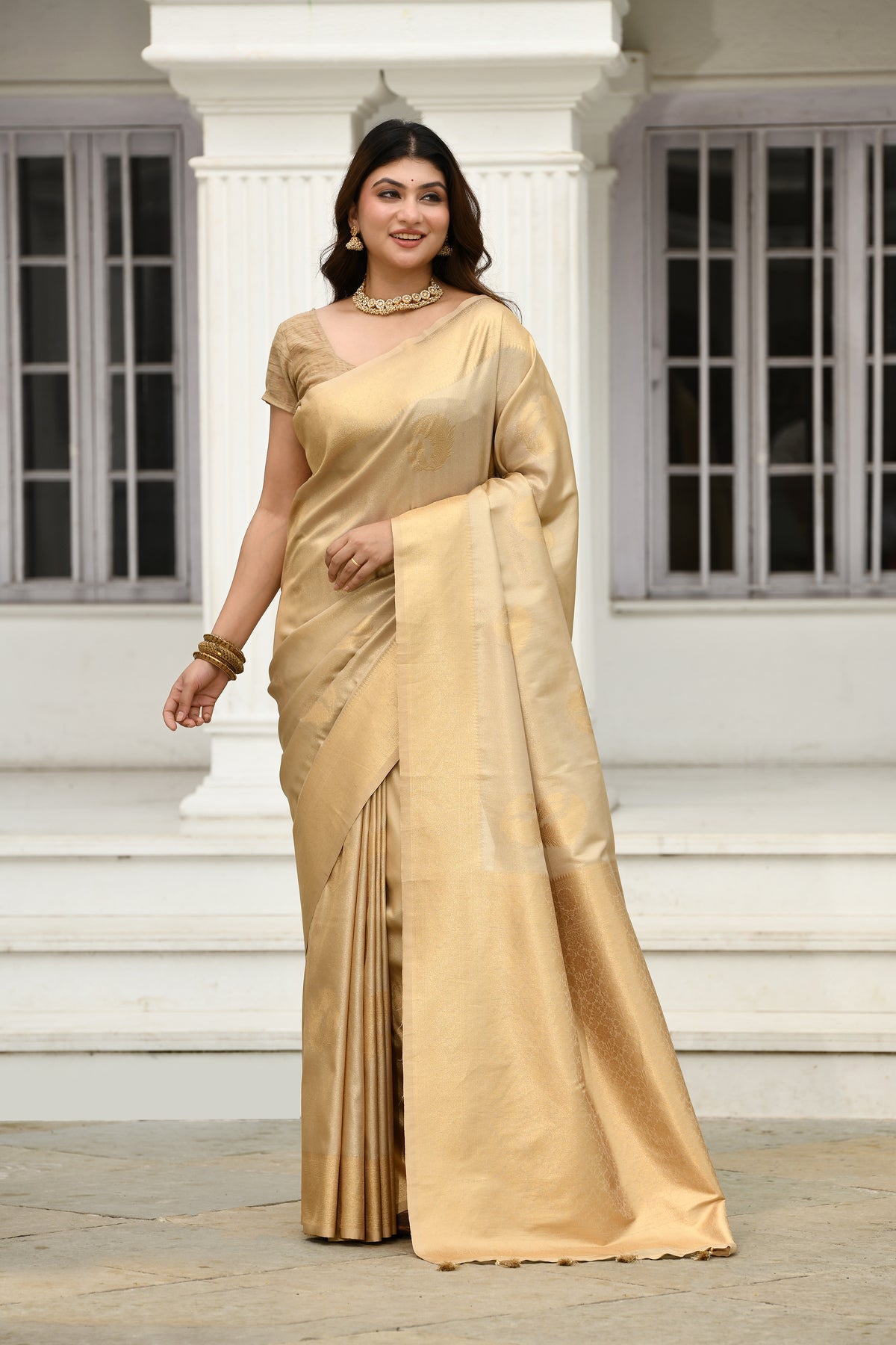 UTSAV BANARAS 547: Tusser Gold Tissue Silk Saree with Floral Buta & Zari Border