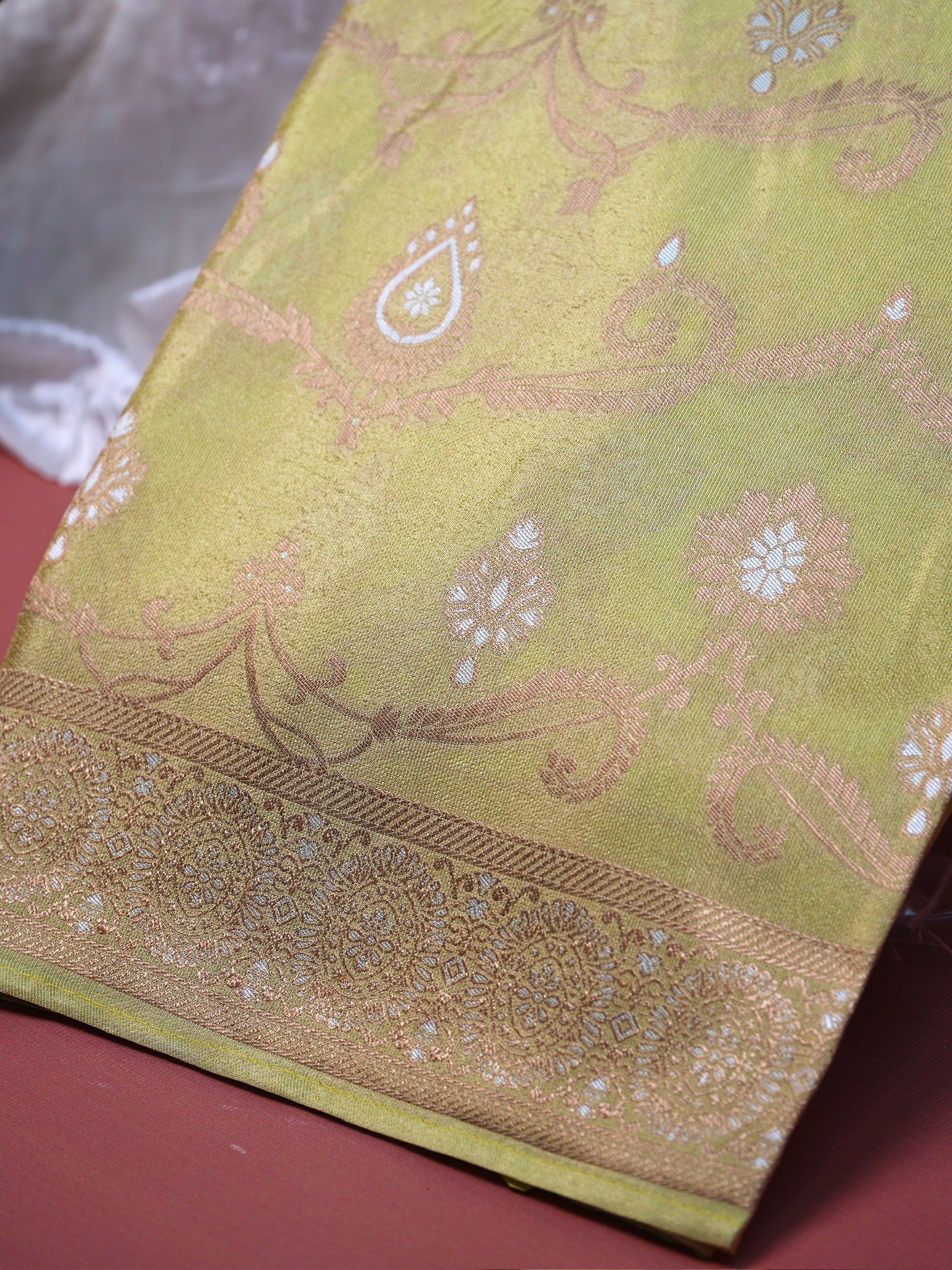 UTSAV BANARAS 428: Pastel Lime Green Tissue Silk Saree with Gold & Silver Zari Floral Paisley Weaving