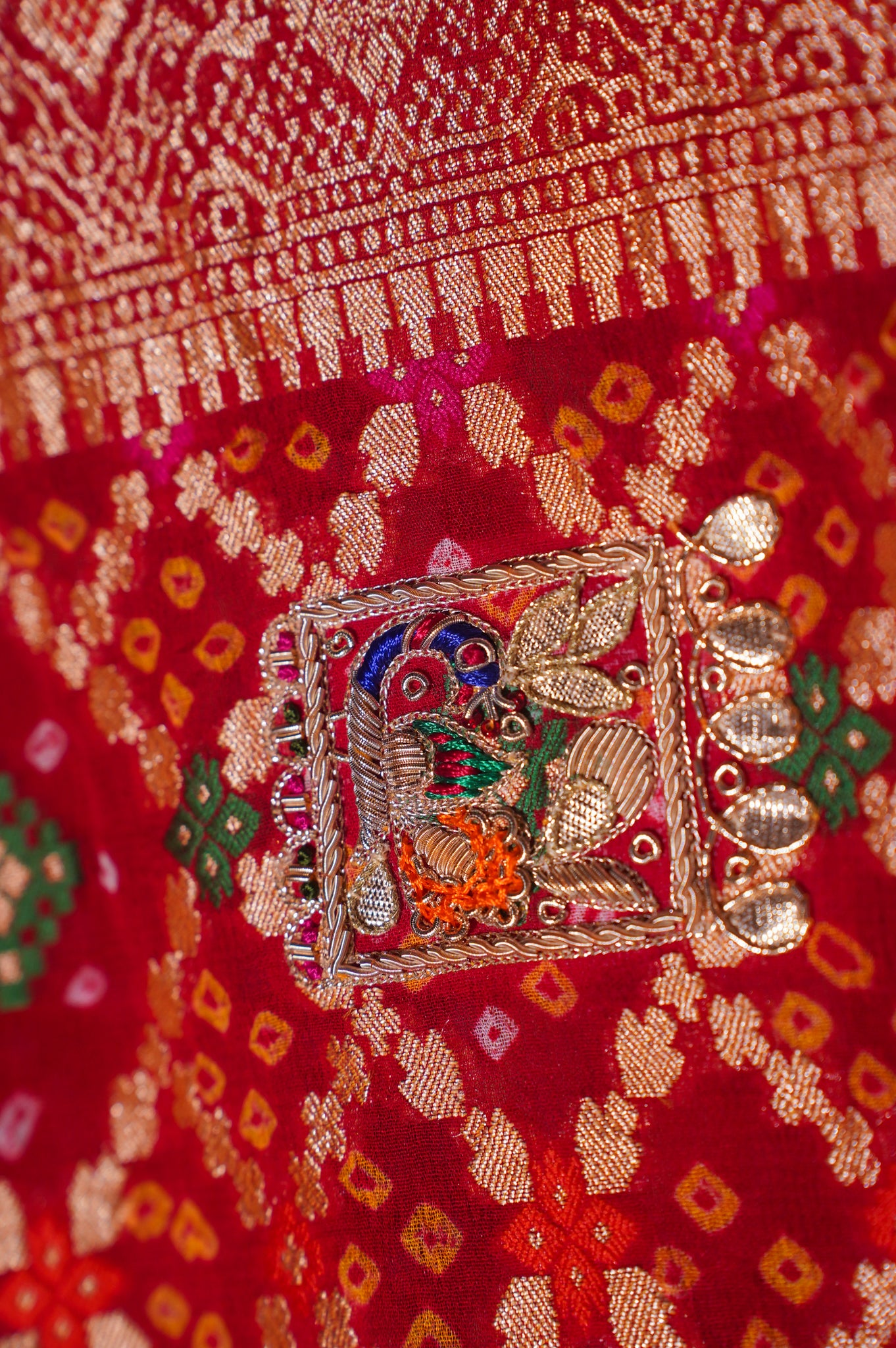 ODHANA 005: Vermilion Red Handcrafted Bandhani Pure Khaddi Georgette Odhana with Zari Border