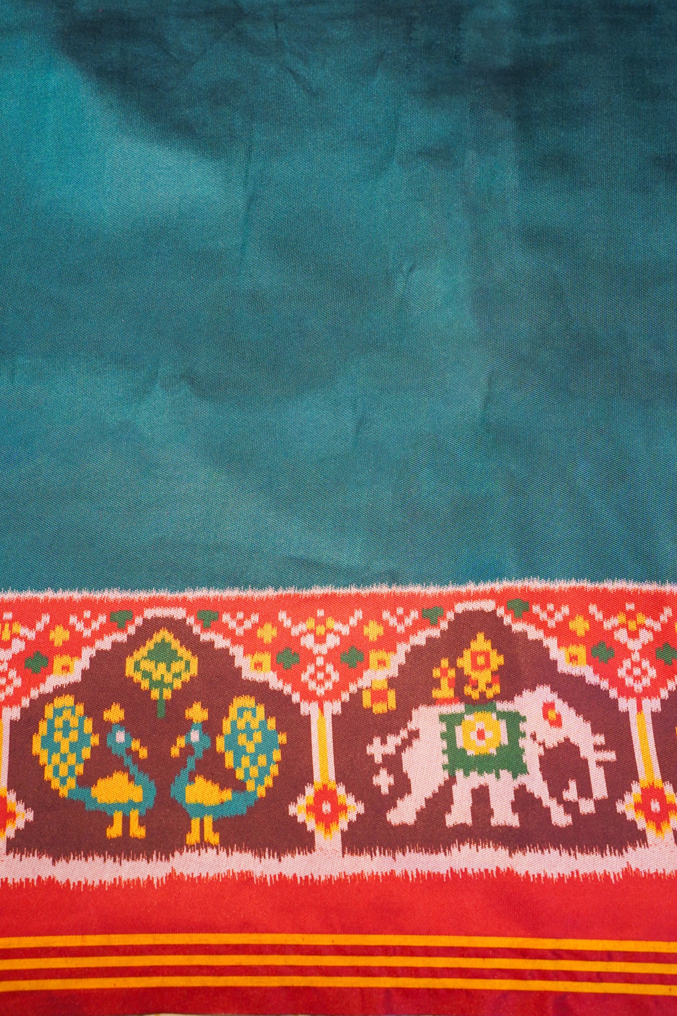 "Utsav Banaras 188" Banarasi Rama Green Patola Silk Saree With Elephant & Peacock Motif Border