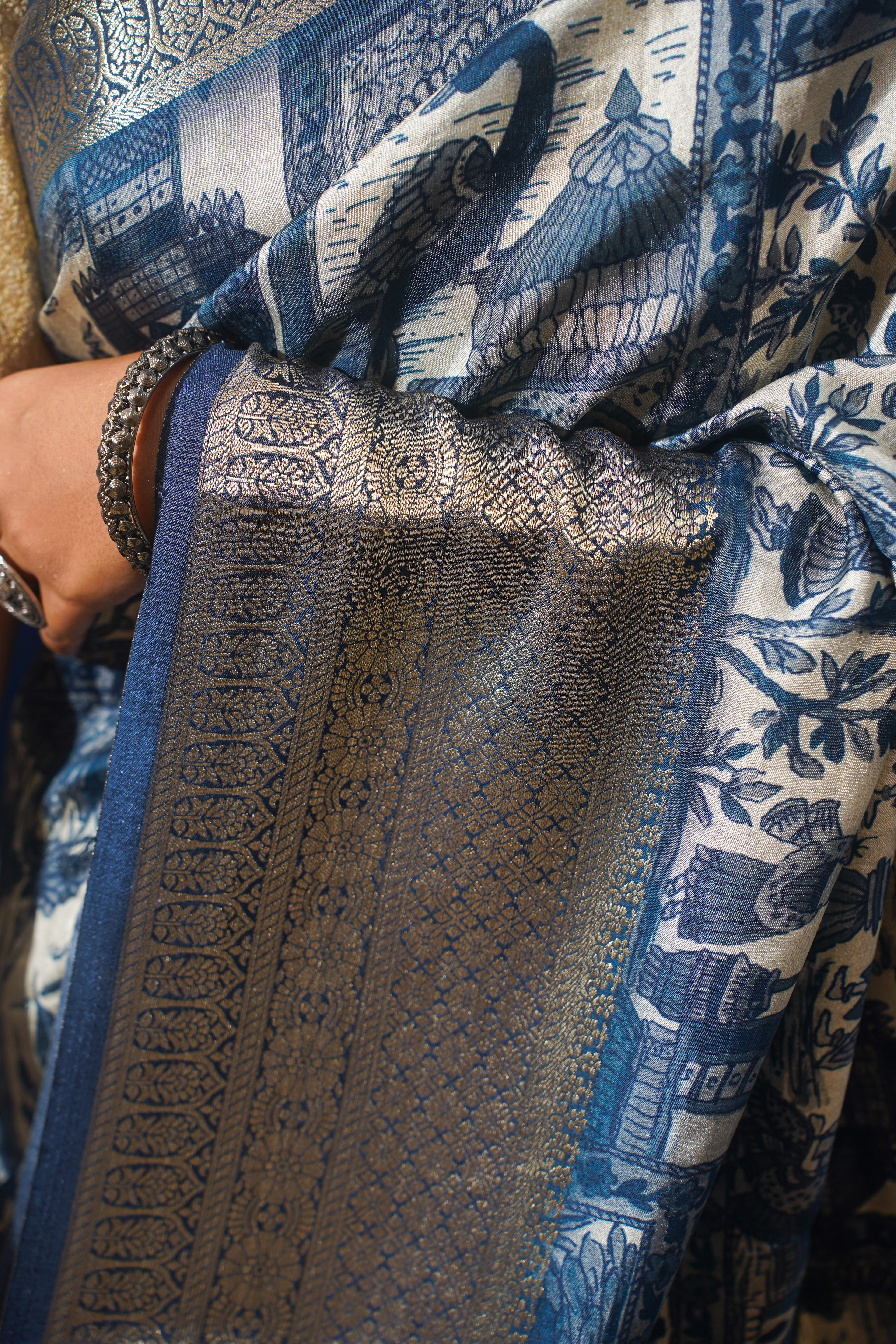 Mrinalini Blue Natural Moonga Georgette Saree with Handloom Border