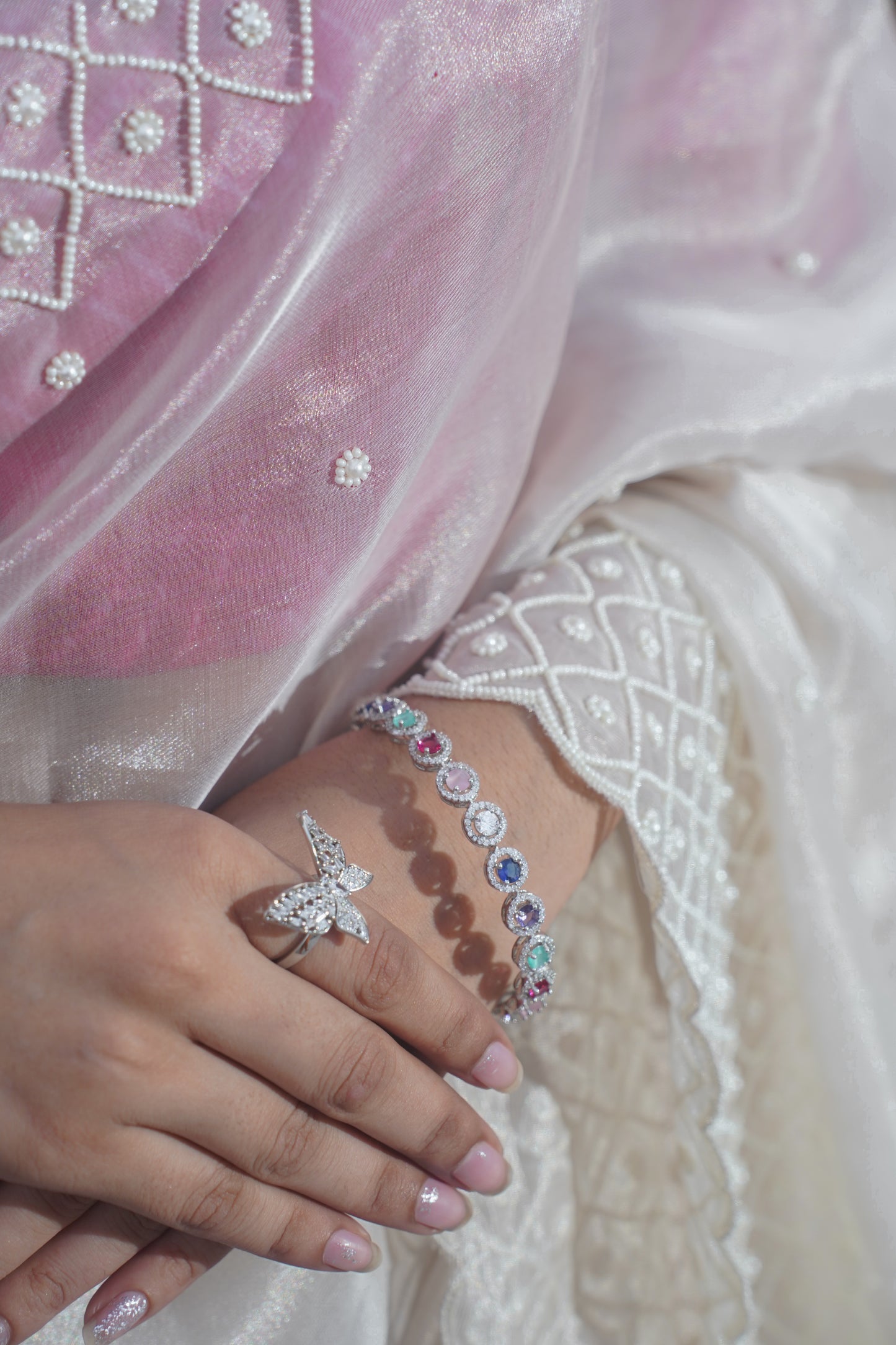 "VIRASAT 126" Off white Banarasi Tissue silk saree with pearl work