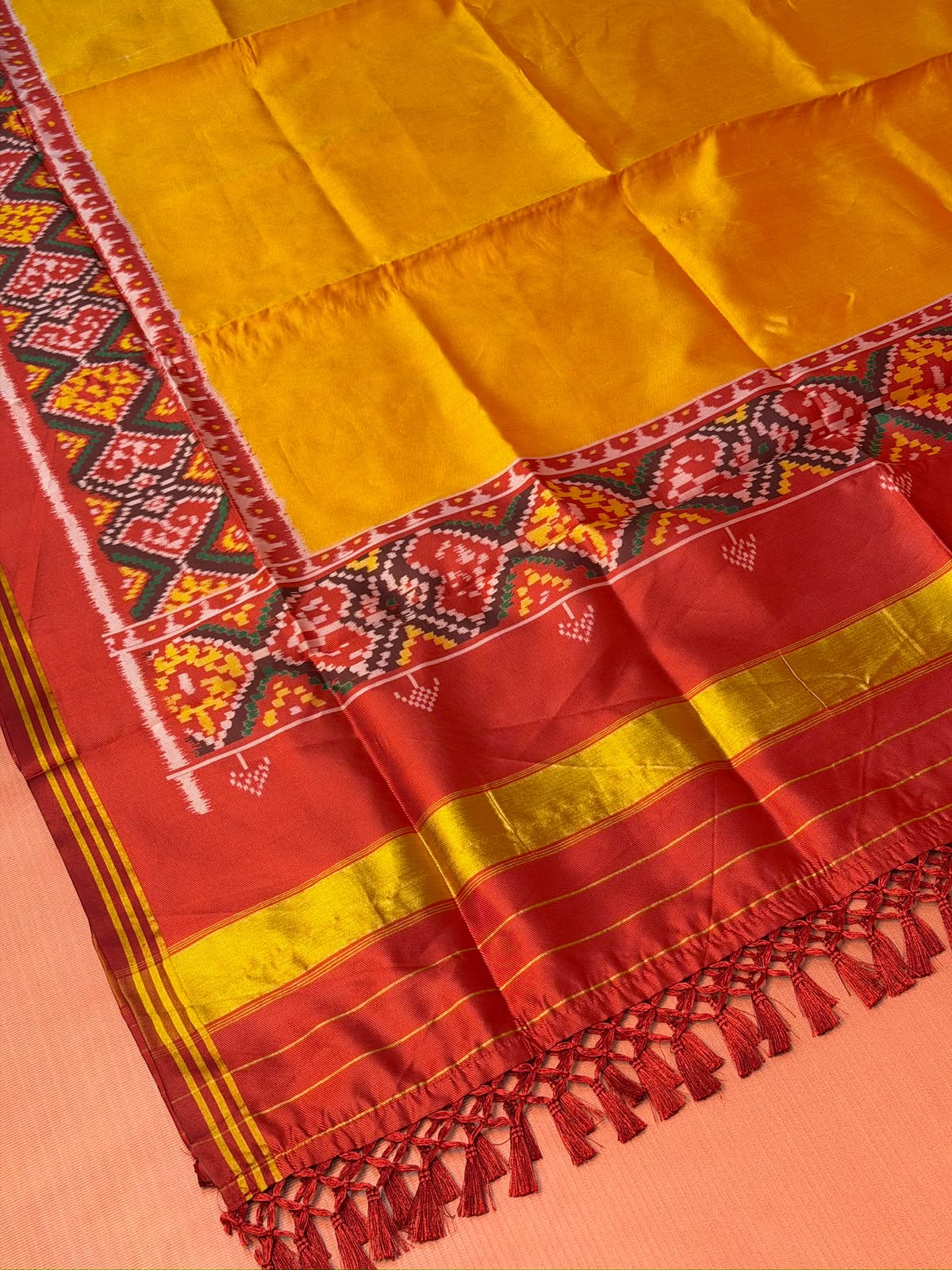 MCD 031: Beautiful Sunset Orange Patola Silk Dupatta With Tassels And Standard Length
