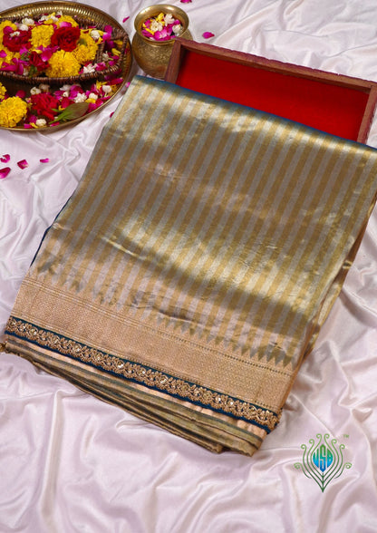 VIRASAT 1004: Olive Green Glass Tissue Dual Zari Silk Saree Striped Elegance with Zardozi Grandeur