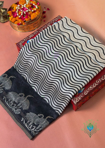 UTSAV BANARAS 408: Steel Grey Raw Silk Saree with Laheriya Design &amp; Silver Floral Buta Border