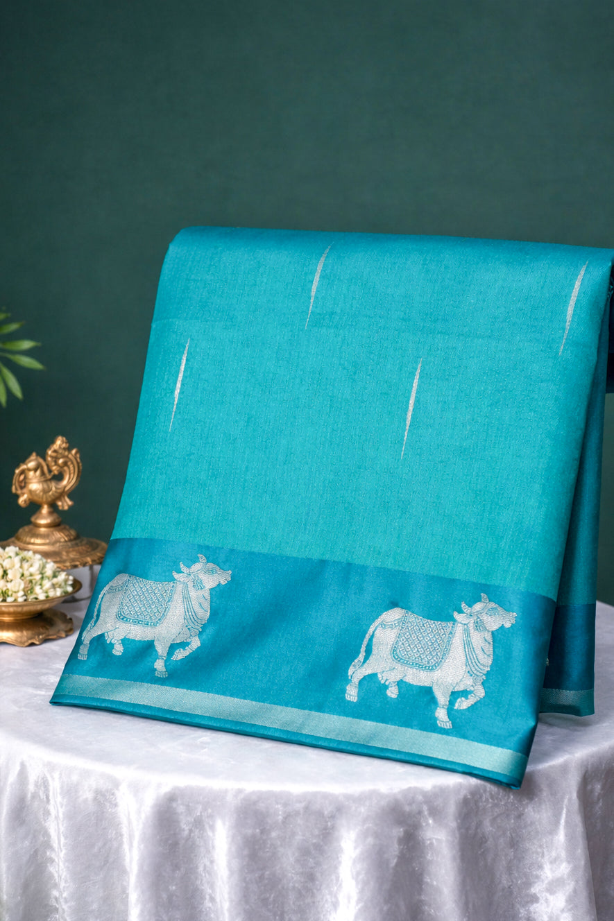 UTSAV BANARAS 247: Sea Green Banarasi Raw Silk Saree Elegant Animal Motif Weave