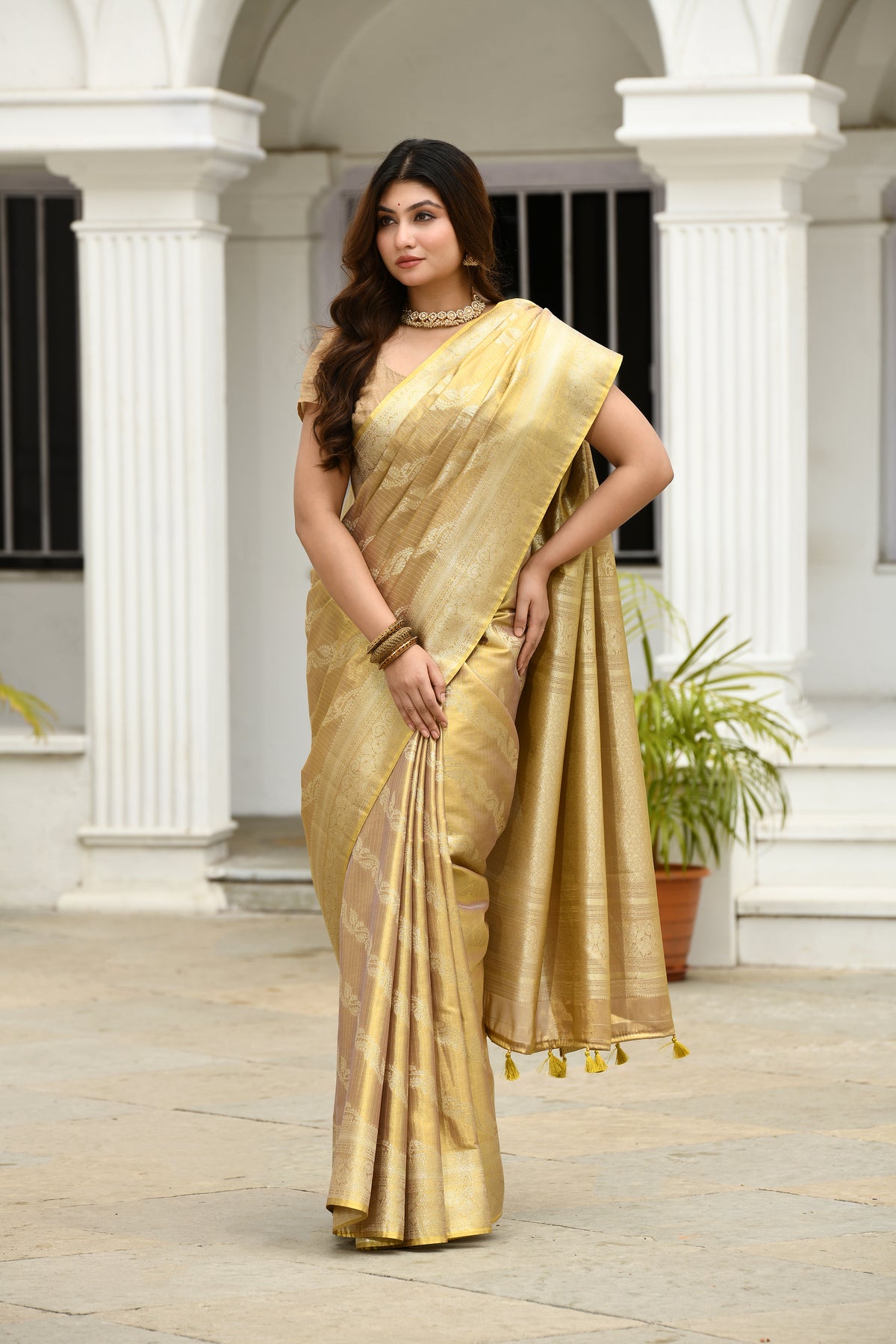 UTSAV BANARAS 550: Golden Tissue Silk Saree with Floral Stripe Weaving