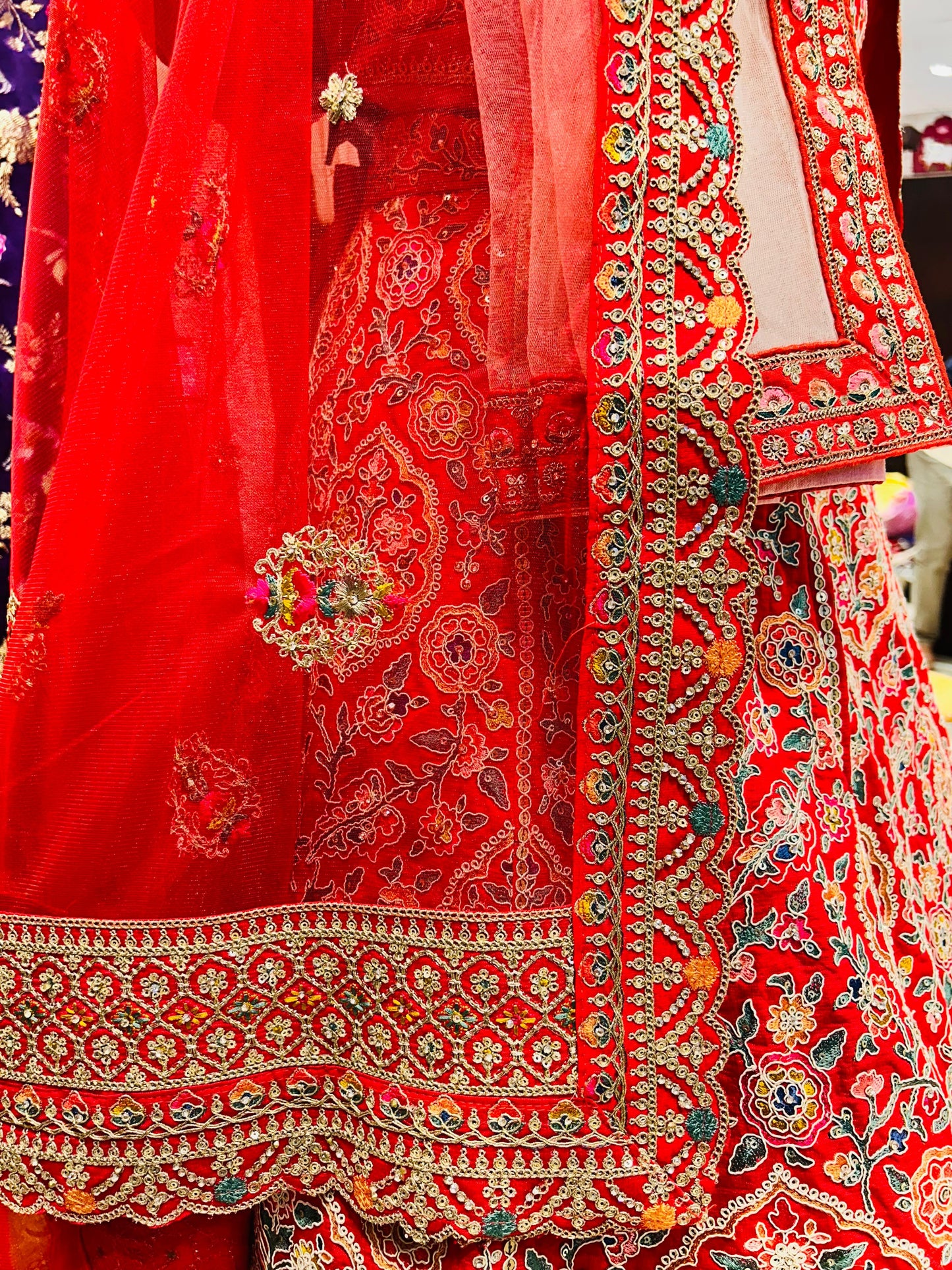 Exquisite Raw Silk Multi-Color Thread Lehenga with Zardozi Work