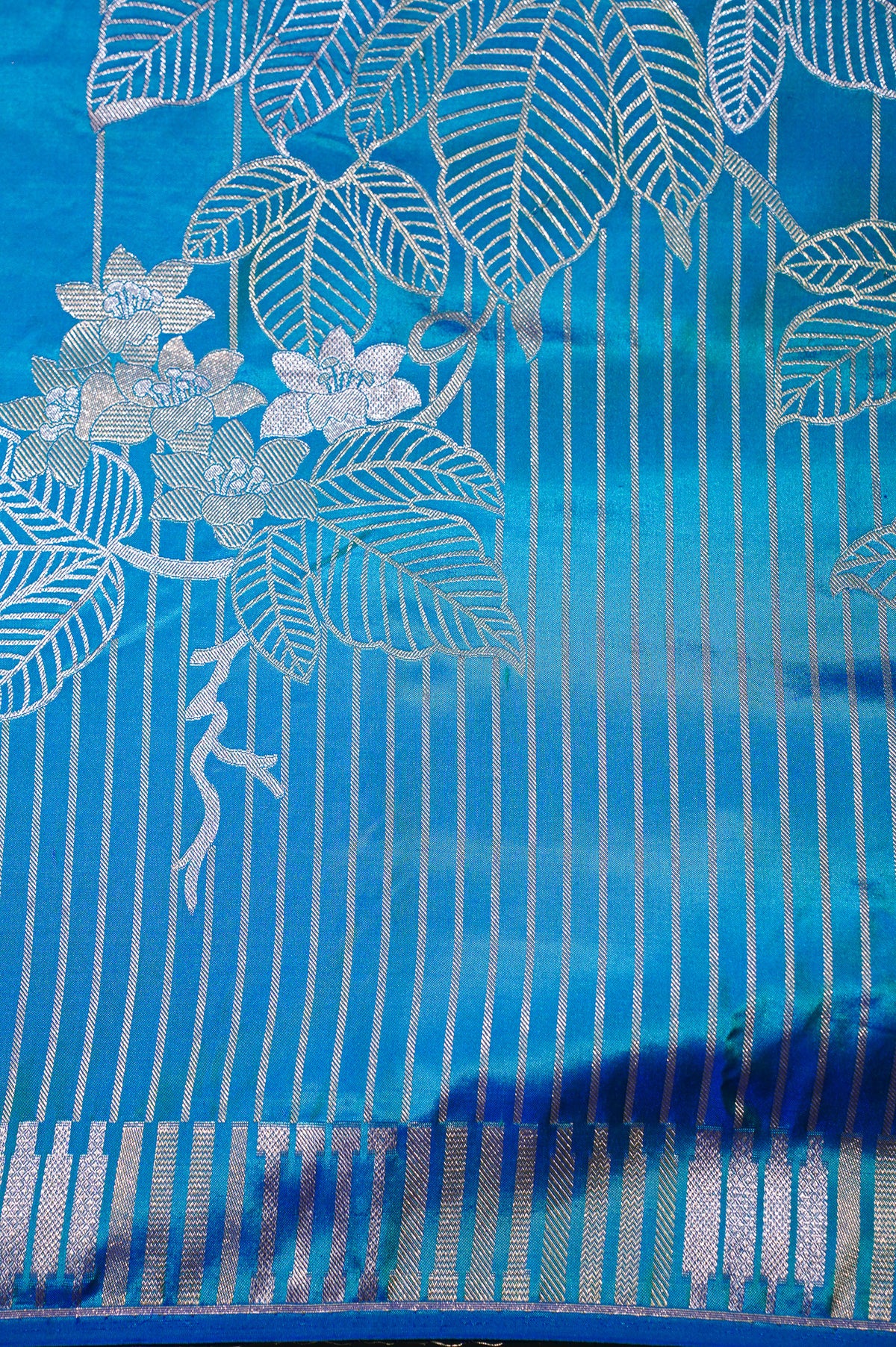 FOUNDER CHOICE 047: Turquoise Blue Katan Silk Saree with Silver Zari Floral Vine &amp; Stripe Design